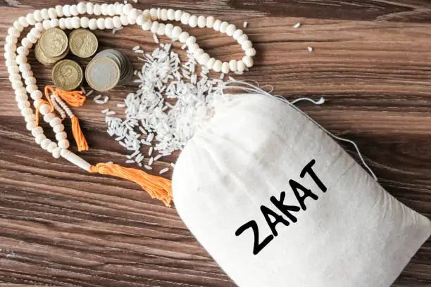 hukum zakat fitrah dengan uang